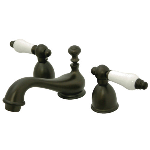 Kingston Brass Restoration Widespread faucet Bathroom Faucet with Drain